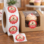 Custom bakery promotion roll labels advertising 25 percent off and applied to a cupcake box.
