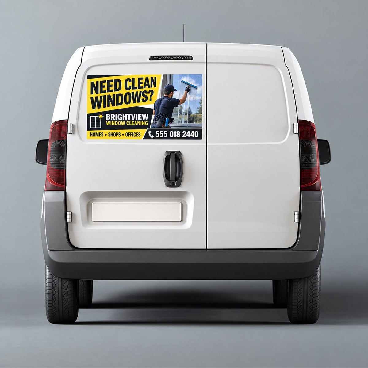 Custom business advertising bumper sticker for a window cleaning service applied to a white work van.