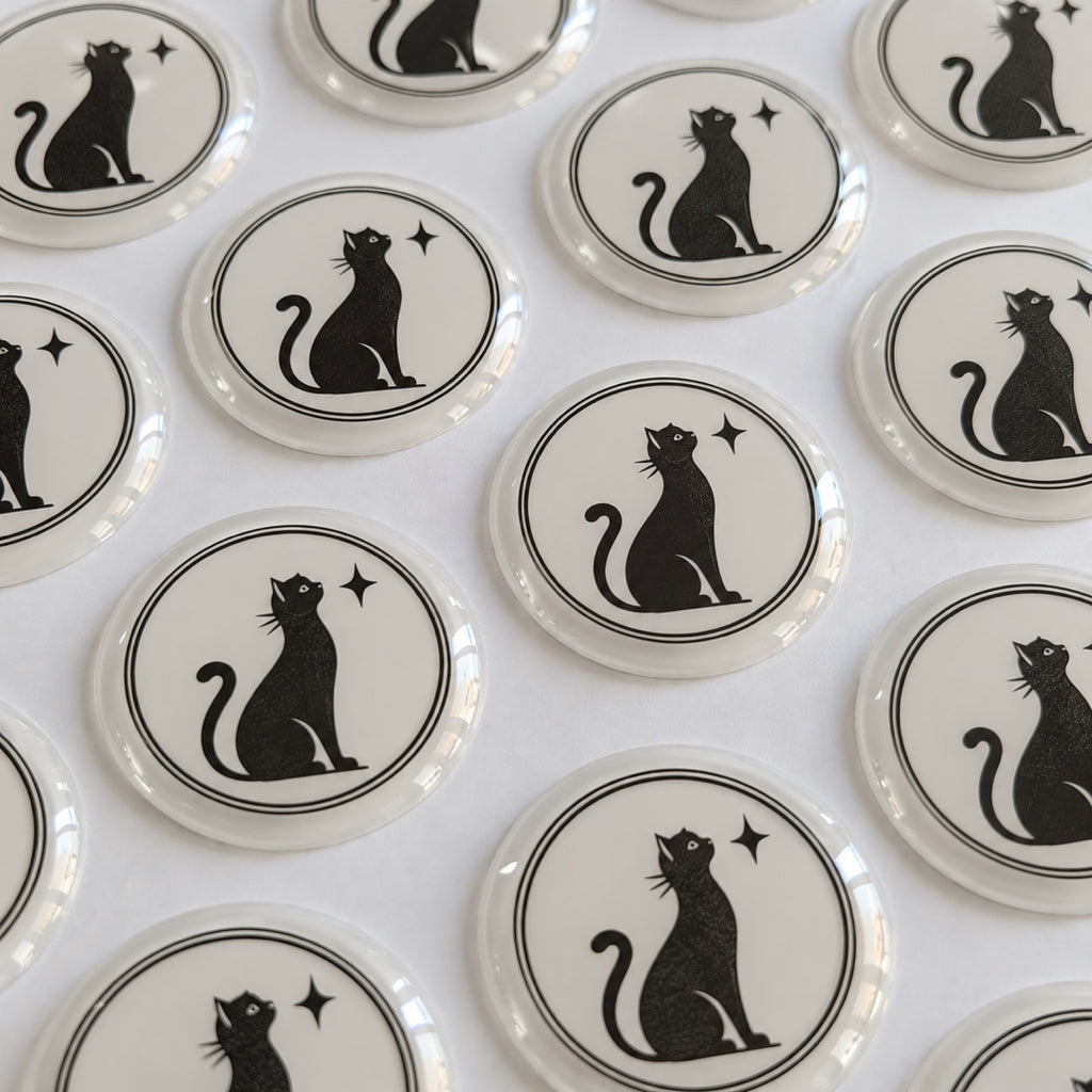 Custom epoxy labels with raised glossy resin surface for durable branding