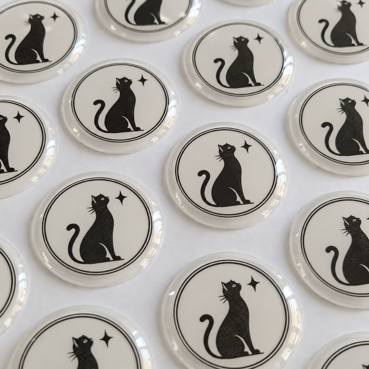 Custom epoxy labels with raised glossy resin surface for durable branding