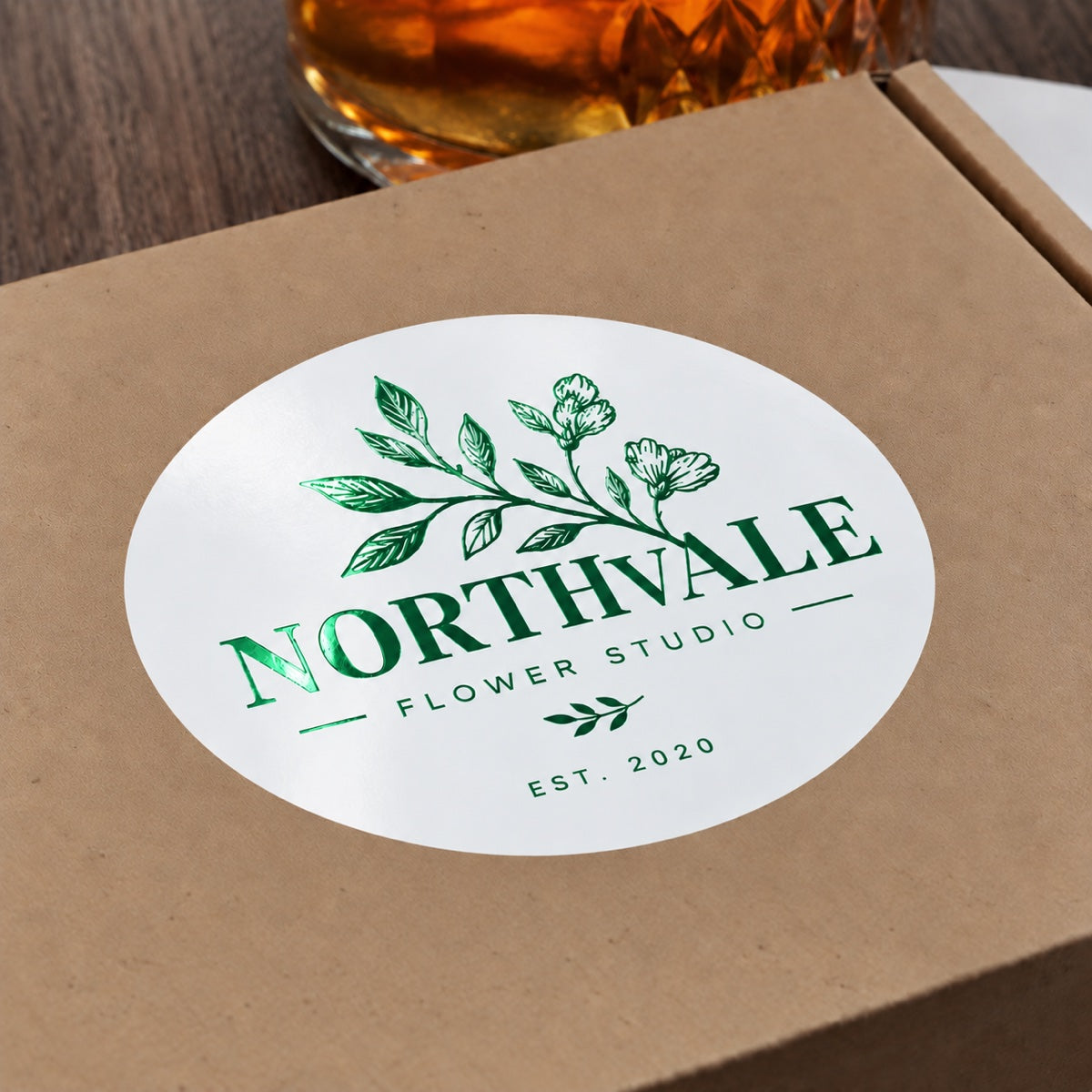 Custom one color foil stickers with reflective metallic finish on product packaging