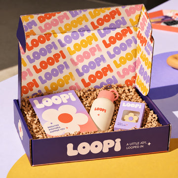 Custom printed corrugated mailer box with playful branded unboxing presentation and packaging inserts