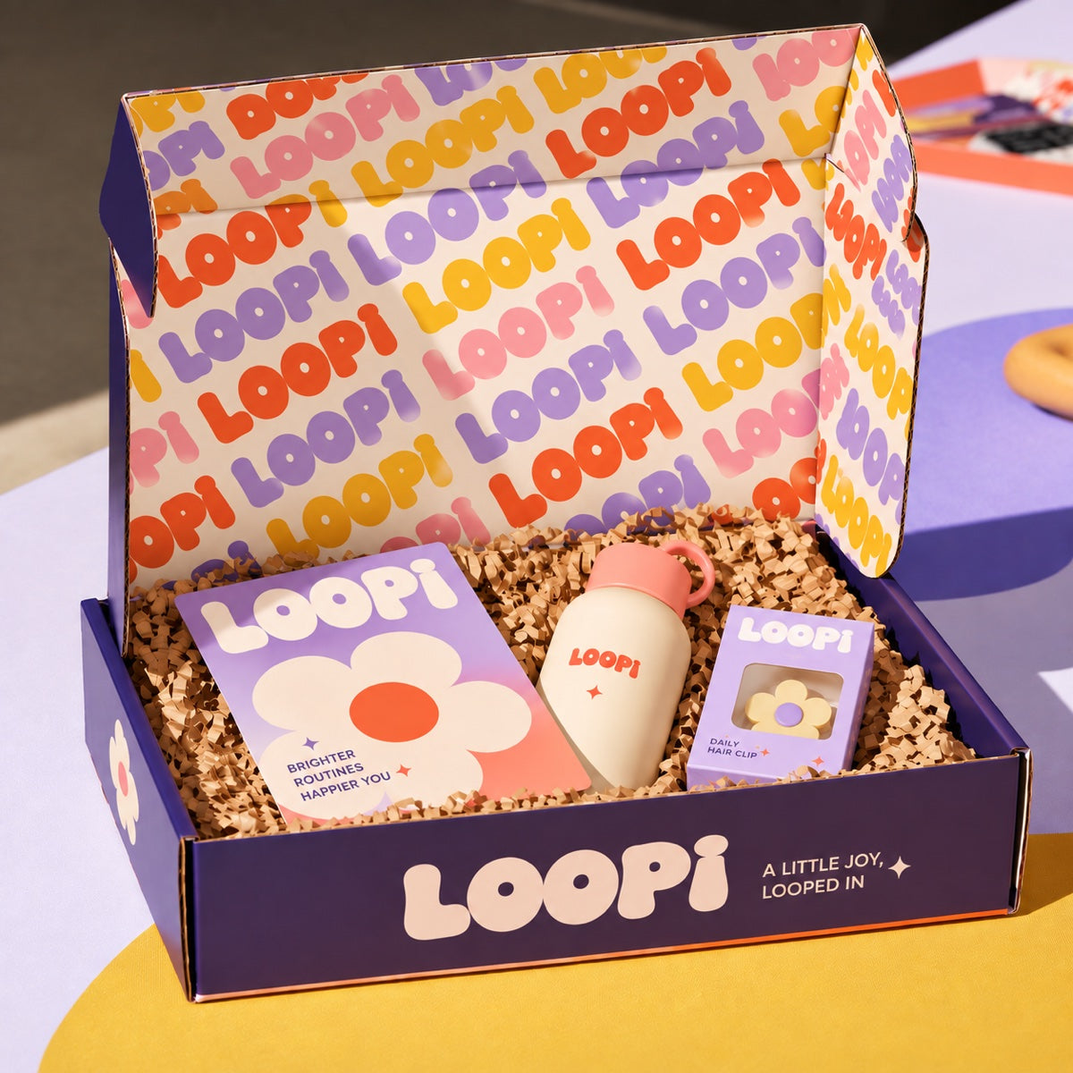 Custom printed corrugated mailer box with playful branded unboxing presentation and packaging inserts