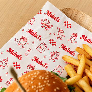 Custom printed food wrapping paper with retro burger wrap design and branded grease resistant paper