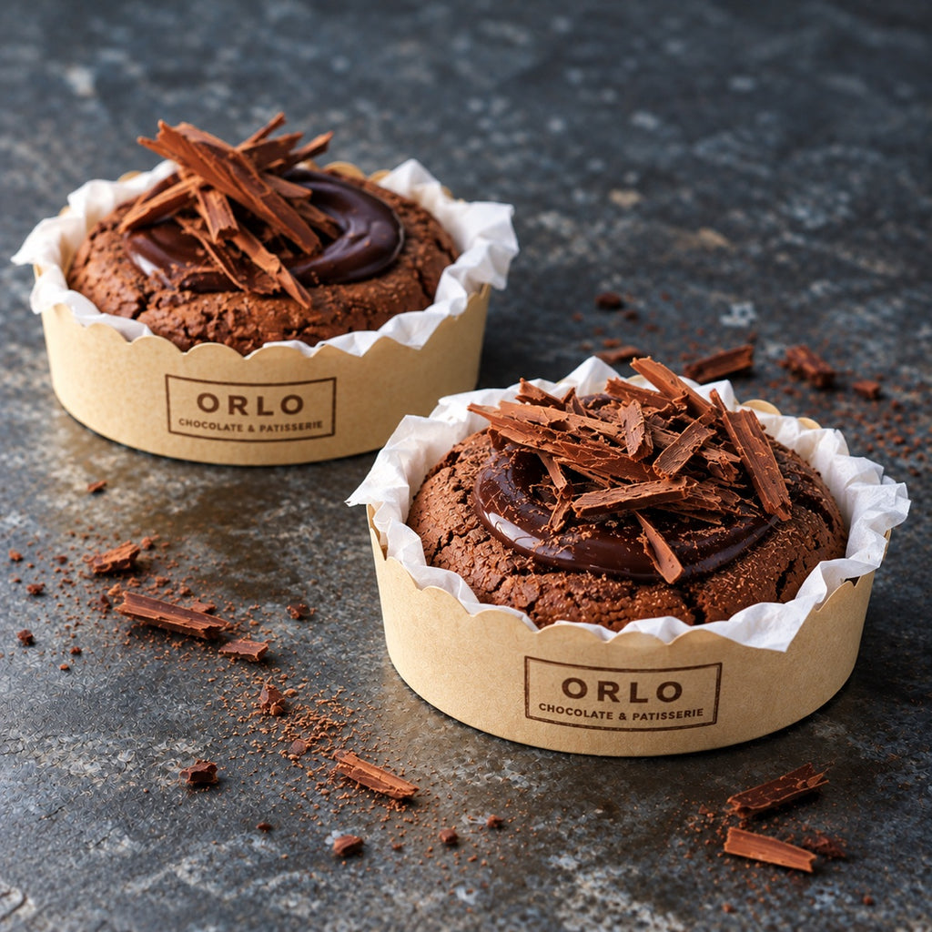 Custom printed paper bakery cups for chocolate patisserie treats with branded cupcake wrapper artwork