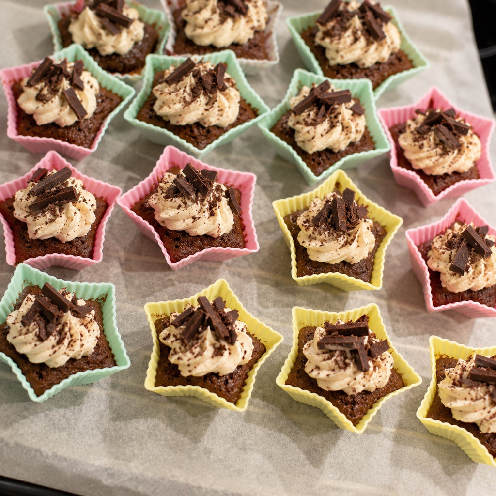 Reusable silicone dessert cups with pastel molds for cupcakes and portioned bakery desserts